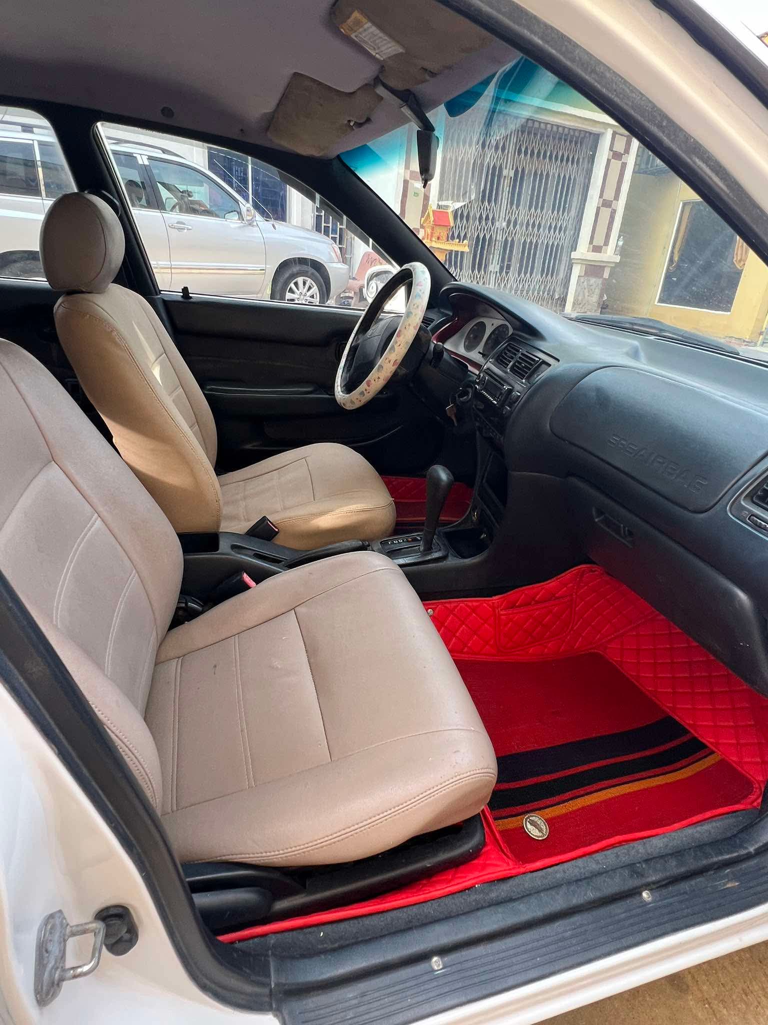 Corolla ឆ្នាំ 1994 ពណ៍ស រៀបចំហើយ